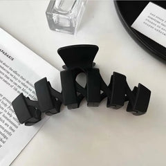 Noir Sculpted Hair Claw