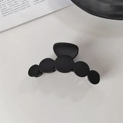 Noir Sculpted Hair Claw